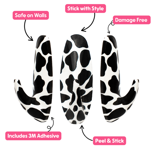 WallCandy Cow Print adhesive wall hooks with 3M strips, peel-and-stick design, safe on walls and damage-free.