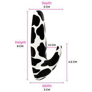 Black and white cow print product with measurements on a white background