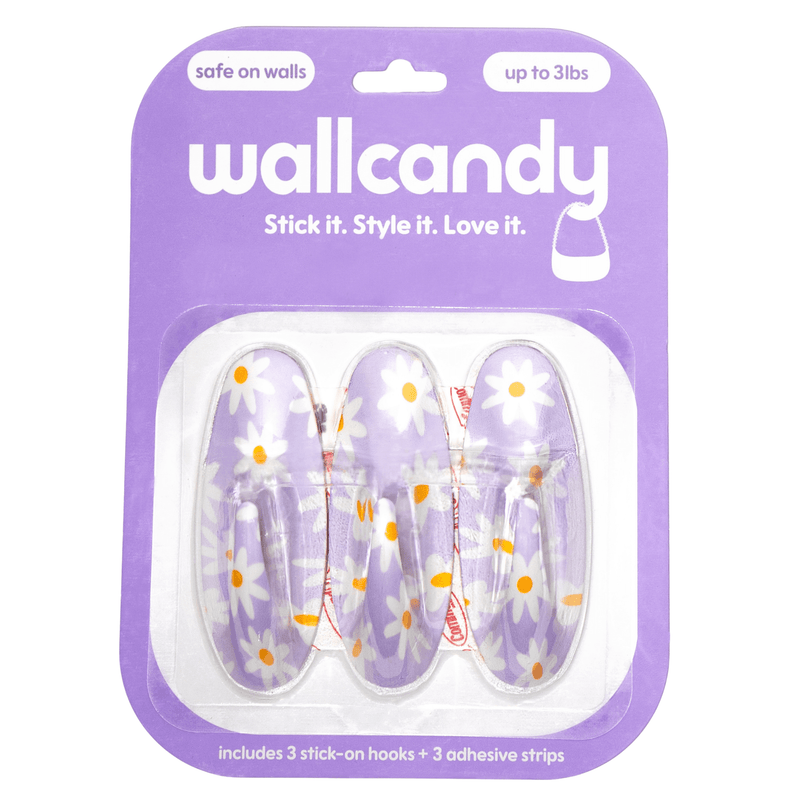 Packaging of wallcandy hooks with floral design on a white background