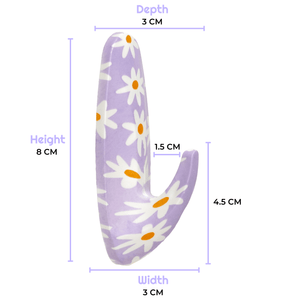 Measurement chart of a purple object with white floral patterns on a white background